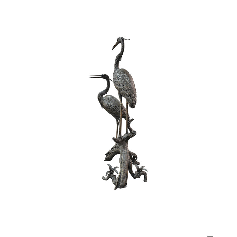 Hérons sur une branche bronze