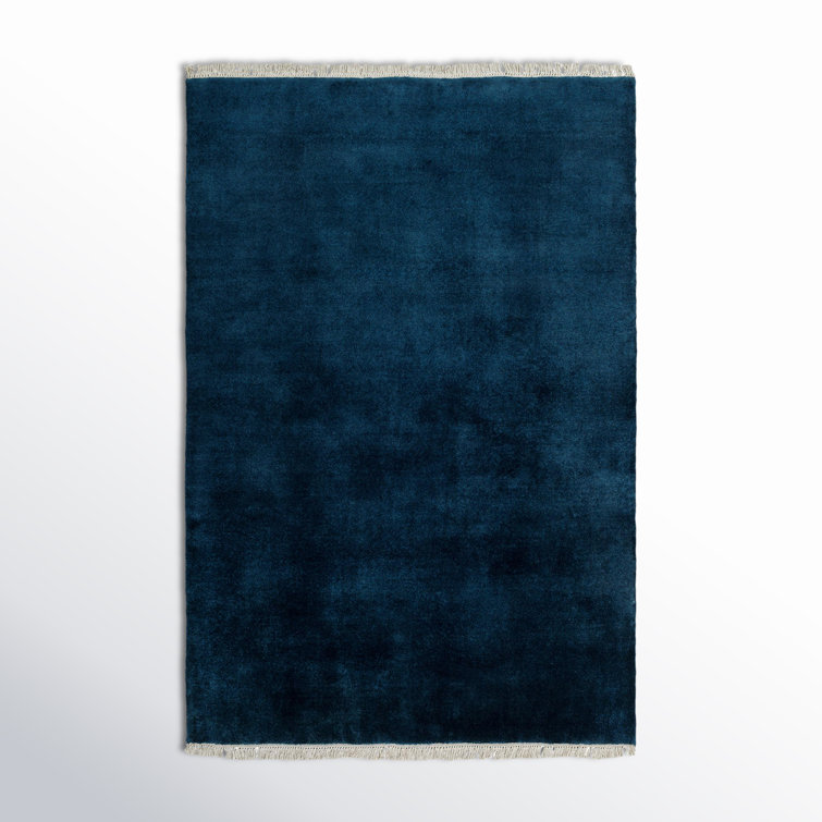 Clio Solid Color Hand Loomed Wool Area Rug in Blue