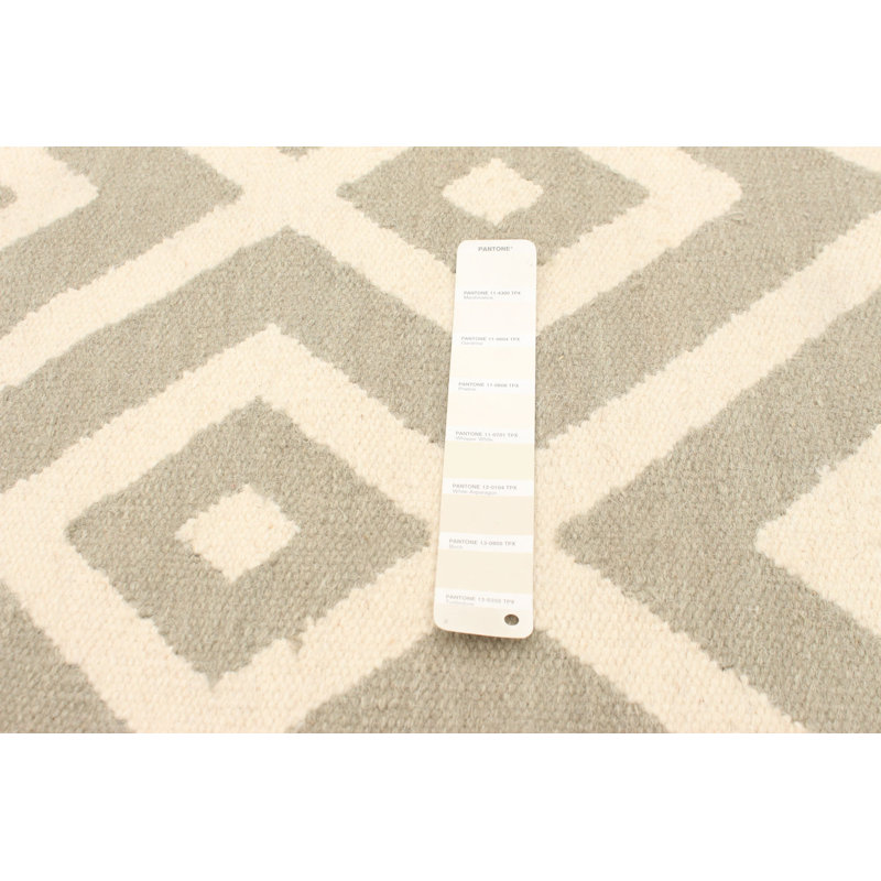 Tapis blanc / beige à motif géométrique en laine Ellim
