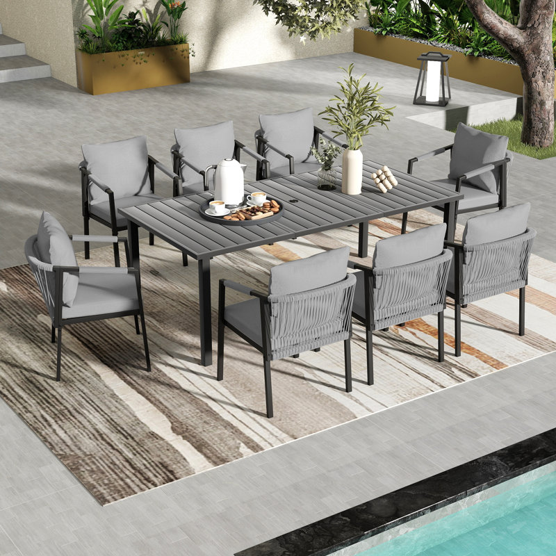 Maurice 9-Piece Hand-Woven Rope Patio Dining Set With Gray Cushions And Umbrella Hole