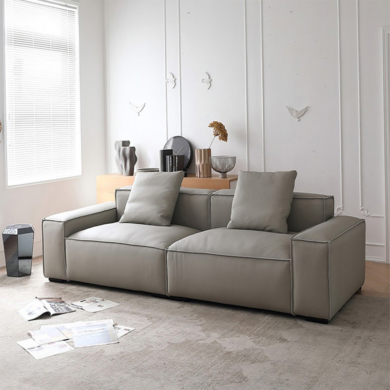 Causeuse-coussin modulable en cuir véritable gris