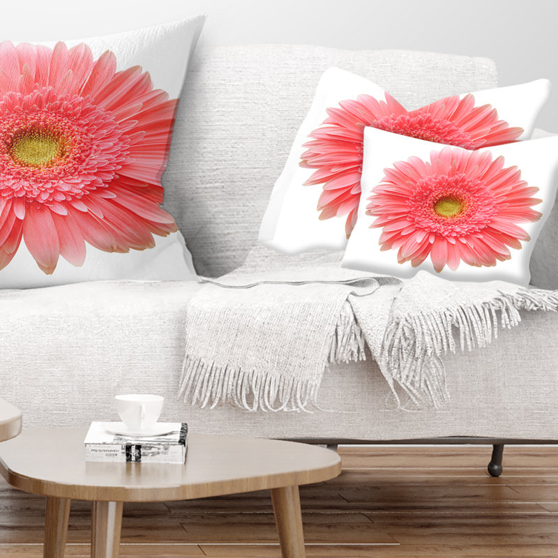 Coussin décoratif simple à motif floral sur fond blanc