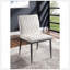 Chaises d'appoint en similicuir ivoire avec structure en métal noir, siège rembourré et design contemporain pour une salle à manger élégante