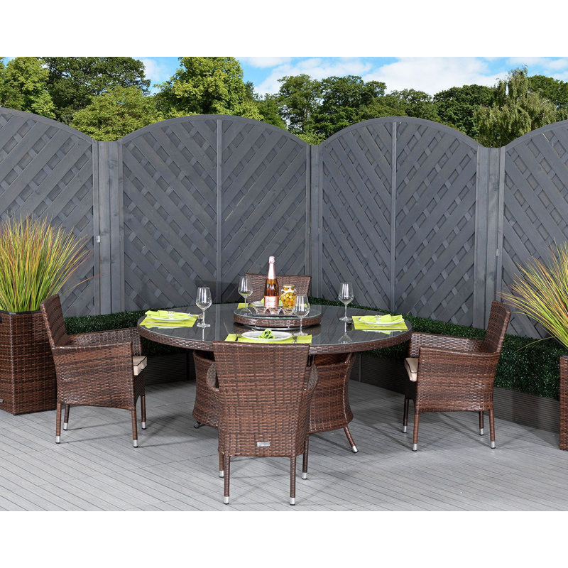 Escobar 4 - Person Patio Dining Set with Round Table , Cushions Included