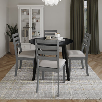5-Piece Dining Set With Black Round Table And Grey Upholstered Ladder-Back Chairs