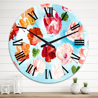 Horloge murale abstraite avec fleurs rouges et roses