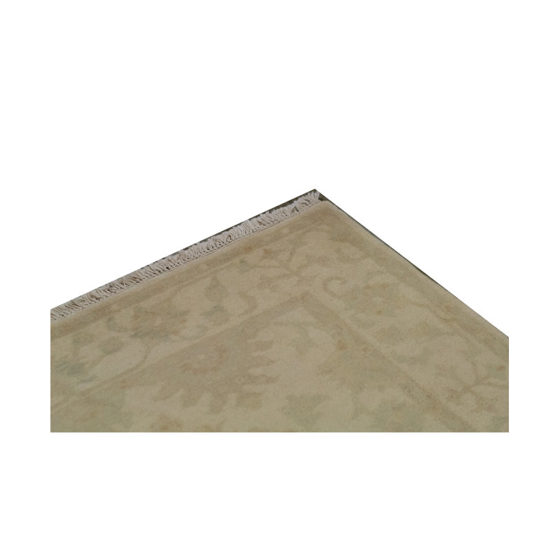Tapis ivoire noué à la main de haute qualité