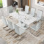Ensemble de table et de chaises Willistine, ensemble de salle à manger moderne simple en marbre avec chaises en polyuréthane, autocollant en marbre, plateau de table en verre trempé, avec pieds de chaise arqués en métal-311650607-311650605