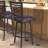 Akintunde Swivel Counter or Bar Height Armless Bar Stool in Auburn Bay with Brown Pu Upholstery-2044030165