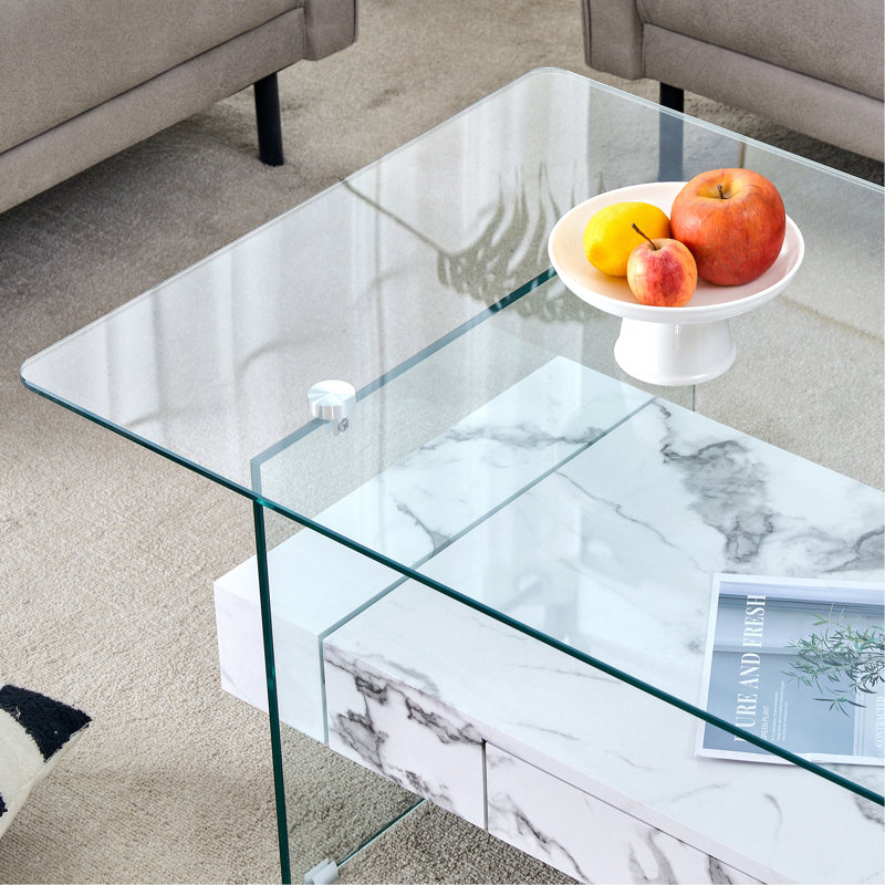 Table basse moderne à deux niveaux - verre trempé transparent et texture de marbre blanc, design de rangement multifonctionnel. L'étage inférieur comprend un tiroir. Peut être utilisé comme table basse, table d'appoint, etc.
