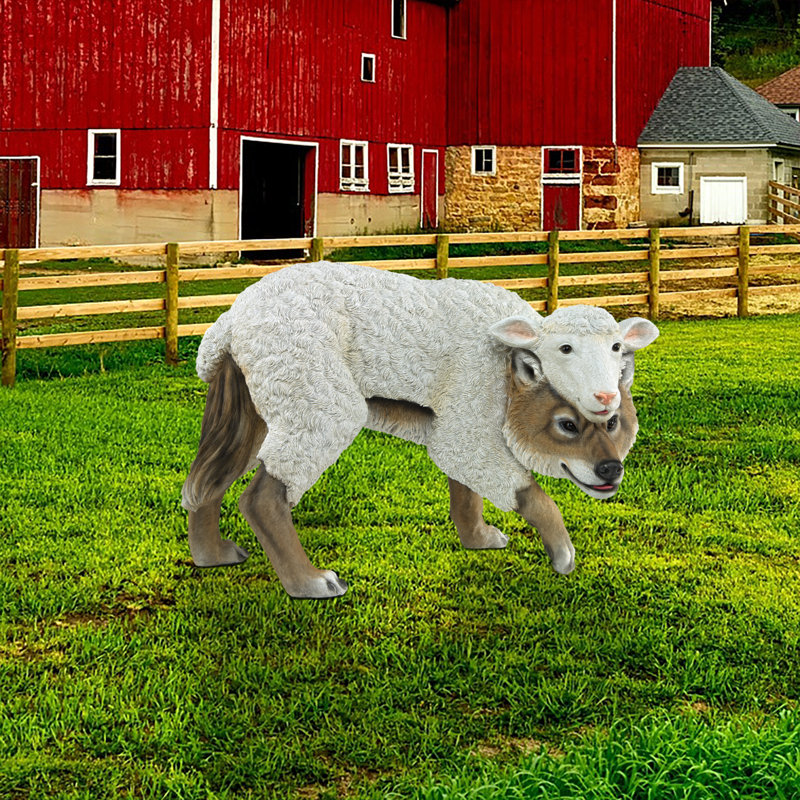 Statue de jardin loup en mouton