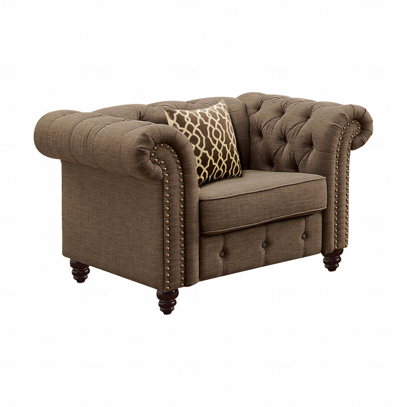 Fauteuil d'appoint brun capitonné avec coussin