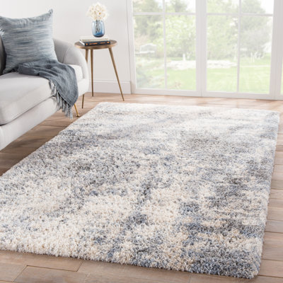 Tapis abstrait gris et bleu Benziger