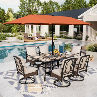 Leonard 6 - Person Rectangular Outdoor Dining Set with Swivel Chairs & Thick Cushions
