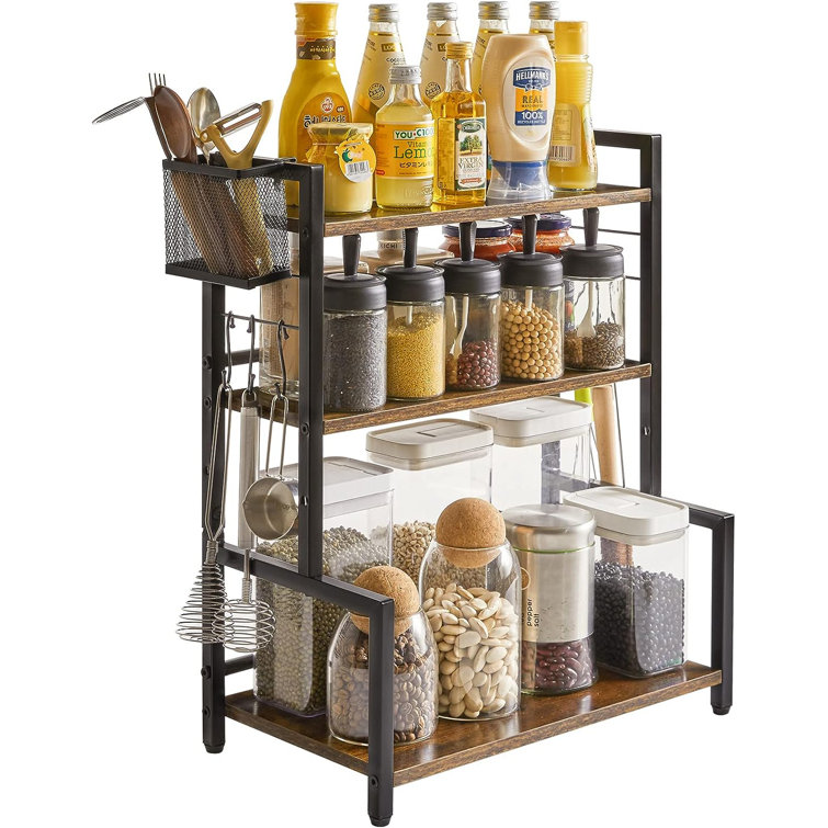 https://assets.wfcdn.com/im/20050583/resize-h755-w755%5Ecompr-r85/2655/265536469/Spice+Rack+Organizer+With+Wire+Basket+And+6-Hooks%2C+3-Tier+Kitchen+Countertop+Shelf+With+Stepped+Design%2C+For+Cupboard%2C+Bathroom%2C+Adjustable+Seasoning+Holder%2C+16.9X9.5X20.9%22+Rustic+Brown.jpg