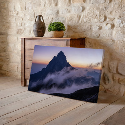 Canvas A Majestic Mountain Peak Rises Prominently Against A Soft Gradient Wall Art Sky Transitioning From Deep Lavender To Warm Peach Canvas Wall Art