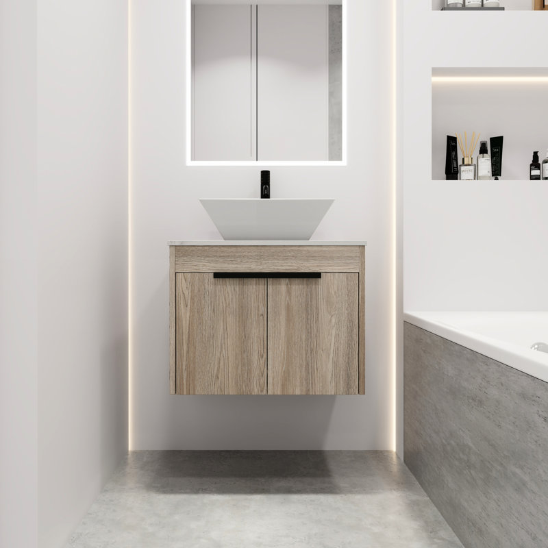 Meuble-lavabo de 24 po avec lavabo en céramique. Style mural en chêne blanc. Porte à fermeture en douceur. Rangement généreux. Poignée en métal. Ardoise moderne 24 po. Chêne. Bassin et abondance de sensation luxueuse