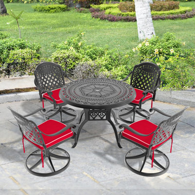 Ensemble de salle à manger 4 personnes pour l'extérieur, table en fonte d'aluminium noire et chaises pivotantes avec coussins rouges, idéal pour le patio, le jardin, la cour, le balcon et la piscine