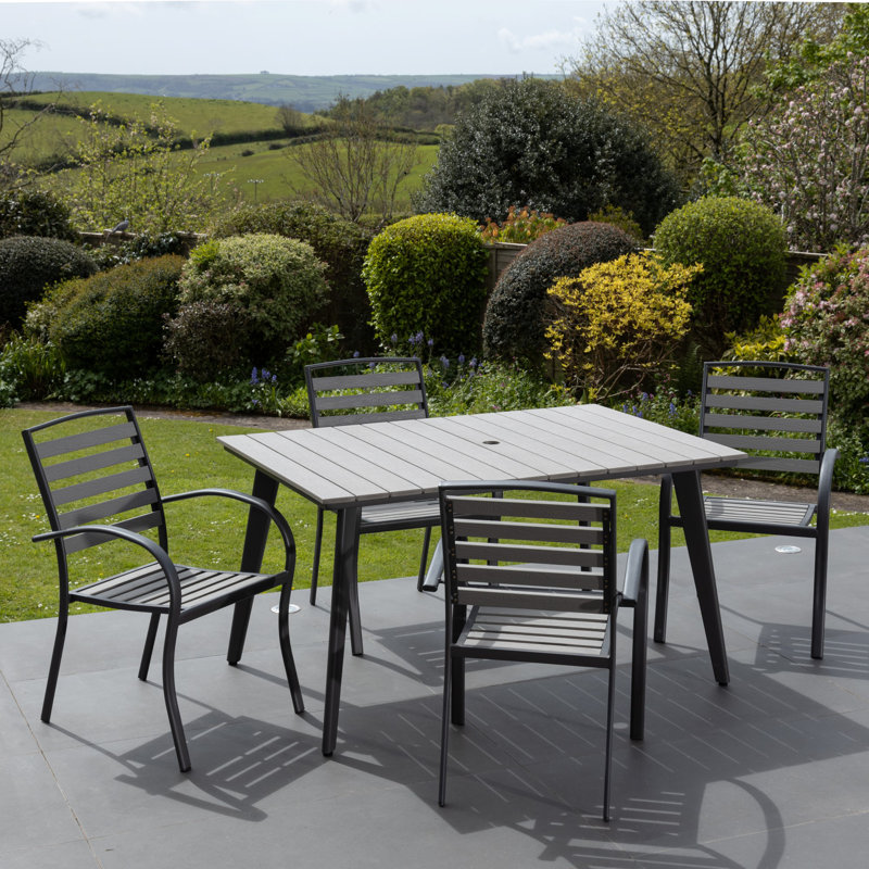 Maddin 4 - Person Patio Dining Set with Rectangular Table , Cushions Included