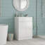 Meuble-lavabo autoportant de 24 po avec lavabo en céramique et 2 portes à fermeture douce
