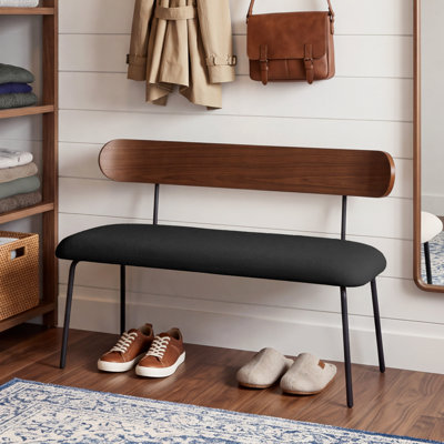 Banc rembourré moderne avec dossier en bois cintré et pieds en métal