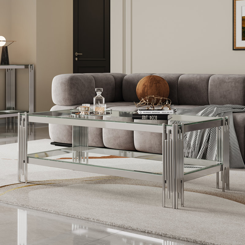Table basse en verre trempé avec double couche et structure en acier inoxydable à finition miroir, durable et élégante