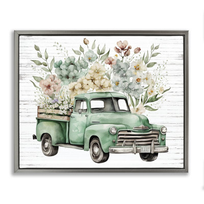 Art floral sur toile flottant encadré par camion