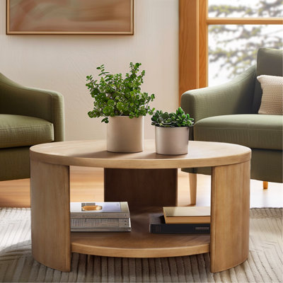 Table ronde avec matériaux mixtes et tablette