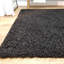 Tapis noir à poils longs Anie-22242481