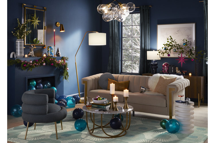 blue living room decorated for new years eve, including balloons and candles