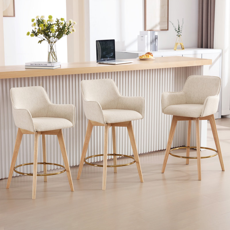 Tabouret de comptoir rembourré à dossier plein H 26,6 po Ashwell avec structure en bois d'hévéa massif et repose-pieds doré (ensemble de 3) Ashwell