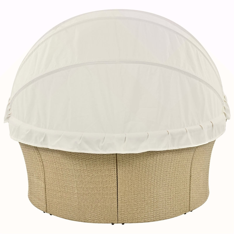 Lit de jour convertible pour terrasse avec auvent rétractable et coussins confortables, parfait pour se détendre au bord du jardin ou au bord de la piscine