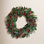 CHRISTMAS MAGNOLIA W BERRY CONE WREATH