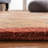 Ezell Hand Tufted Wool/Cotton/Latex Floral Rug in Rust-16768922