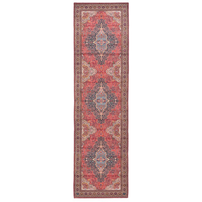 Wessley Cotton/Chenille Machine Washable Southwestern Rug in Rust/Navy