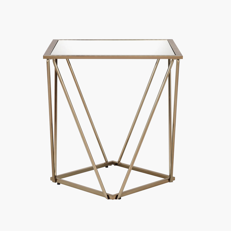 Table basse, miroir et finition or champagne