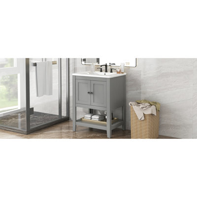 Meuble-lavabo gris avec structure en bois massif, lavabo en céramique et espace de rangement spacieux de 24 po, trop-plein intégré