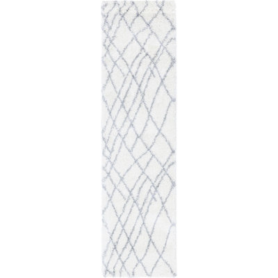 Tapis ivoire à motif géométrique