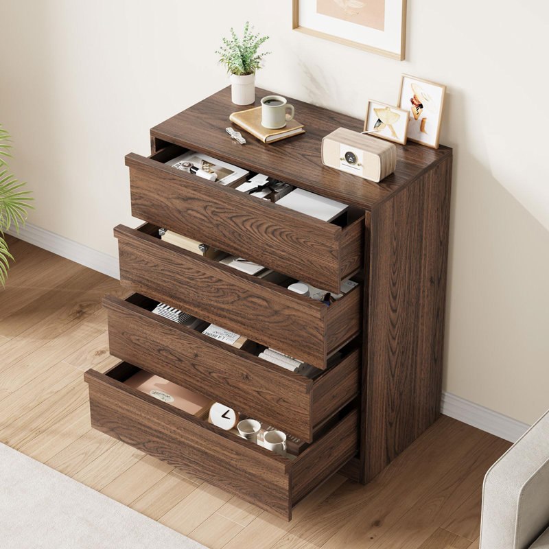 Commode noire à 4 tiroirs avec poignées intégrées: Commode en bois moderne pour la chambre à coucher, le salon et le vestibule