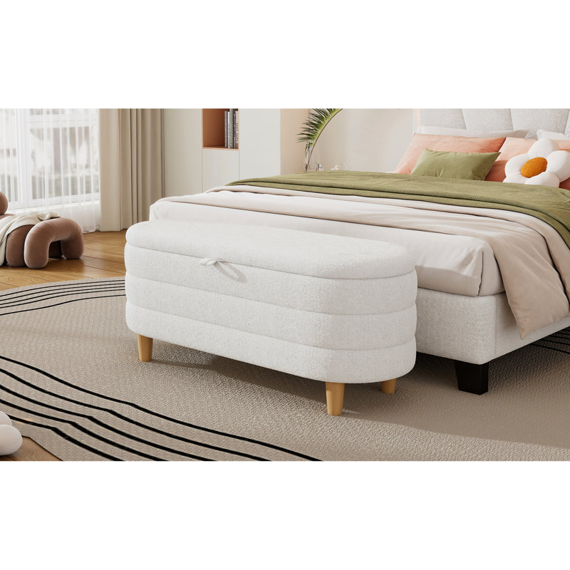 Rangement blanc moderne avec revêtement et pieds en bois pour la chambre à coucher