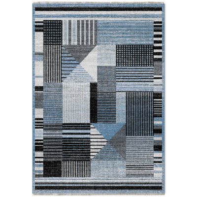 Tapis rectangulaire Dekle avec envers antidérapant