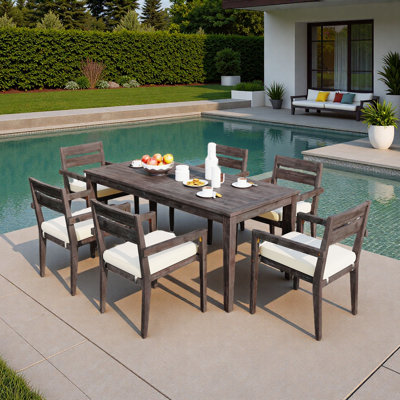 7 Pieces Outdoor Dining Set Included 1 Large Table And 6 Stackable Chairs  With Cushions And Waterproof Feature