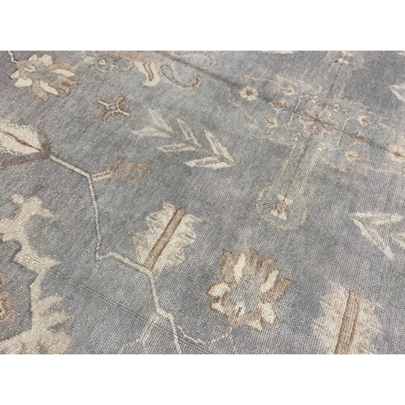 Tapis bleu et ivoire noué à la main de haute qualité