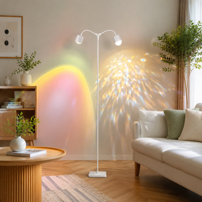 White double-end 3D ocean-wave sunset projector LED floor light with remote, 16 colors, 720° rotation, Four Mode, and a U.S.-standard plug; modern standing night light for bedrooms.