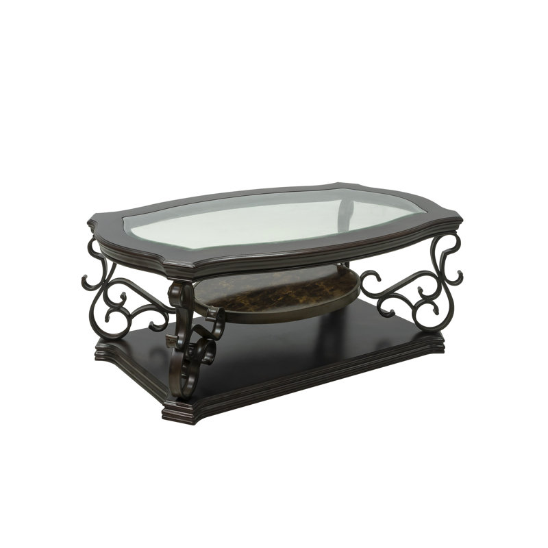 Et table de cocktail en métal brun, avec plateau en verre brun foncé, cadre de table