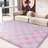 White and pink checkered indoor area rug, festive decor suitable for living rooms, studies, and children's rooms.-1019347576-1019347582