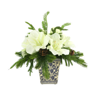 https://assets.wfcdn.com/im/20177344/resize-h310-w310%5Ecompr-r85/2196/219680638/faux-amaryllis-holiday-floral-arrangement.jpg