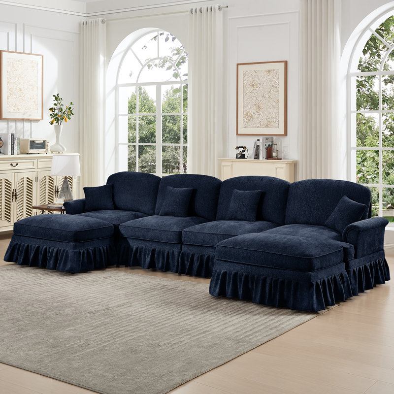 Canapé modulaire classique en U à 4 places avec accoudoirs évasés, volants amovibles et pieds fuselés, canapé à assise profonde avec repose-pieds mobiles, bleu