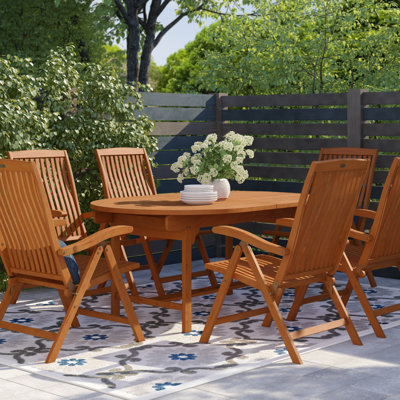 Mahmut 6 - Person Wood Patio Dining Set with Oval Table