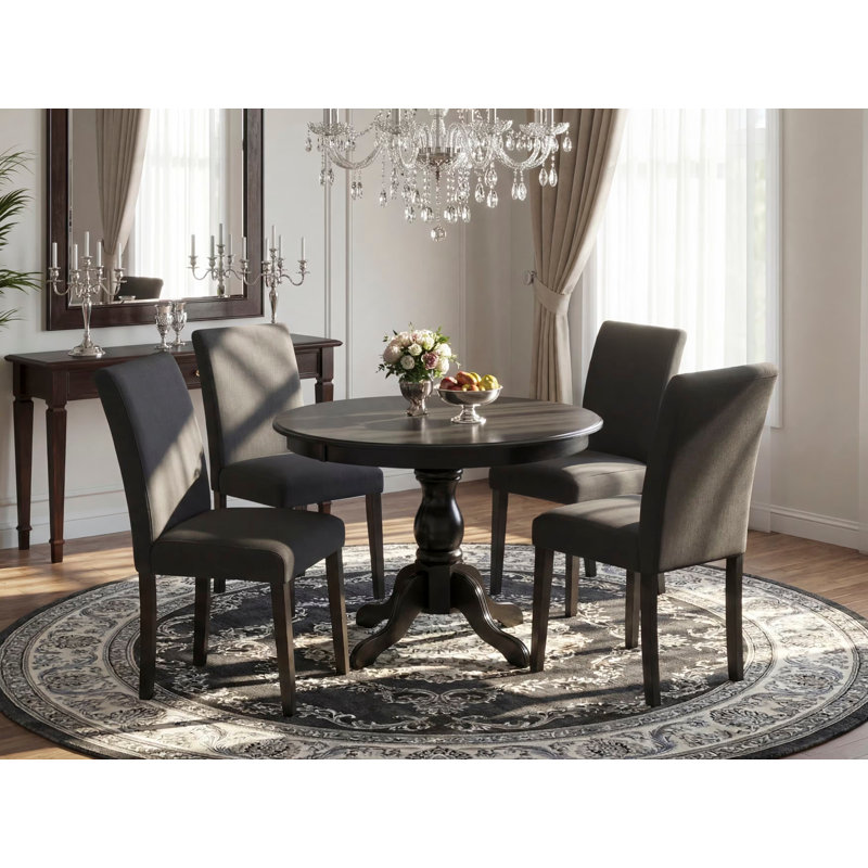 Ensemble de table à manger 5 pièces pour 4 personnes comprenant une table ronde avec piédestal et 4 chaises de salle à manger Parson en tissu noir, noir brossé